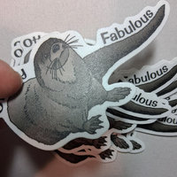 Texture of 'Otterly Fabulous' 3/5" sticker